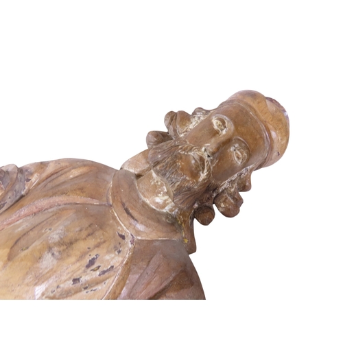 39 - A large early continental carved ecclesiastical fruitwood figure depicting St. Roche, raised on box ... 