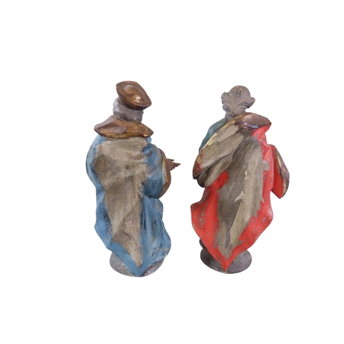 40 - A good pair of Belgian carved wood and overpainted allegorical figures, one in the form of a cloaked... 