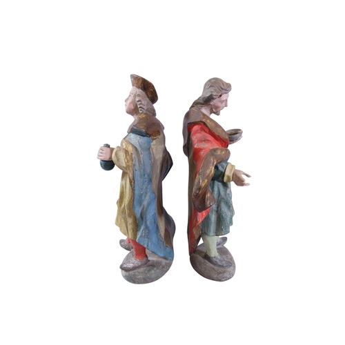 40 - A good pair of Belgian carved wood and overpainted allegorical figures, one in the form of a cloaked... 