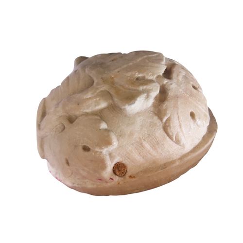 42 - A well carved antique white marble relief bust, study of a maiden, her hair in ringlets and adored w... 