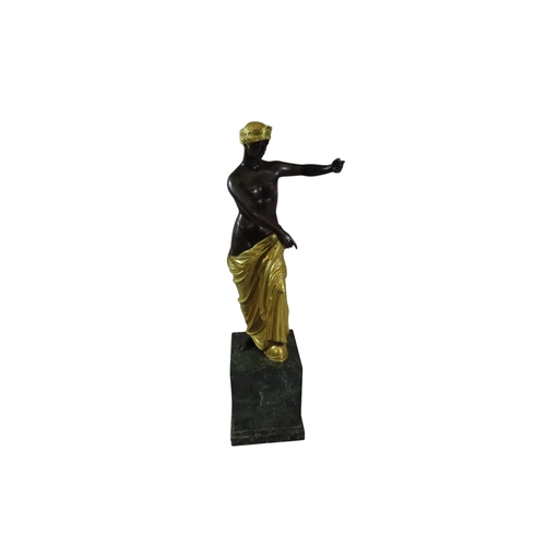 48 - A Late 18th / early 19th century continental patinated and gilt bronze figure of Venus, presented in... 
