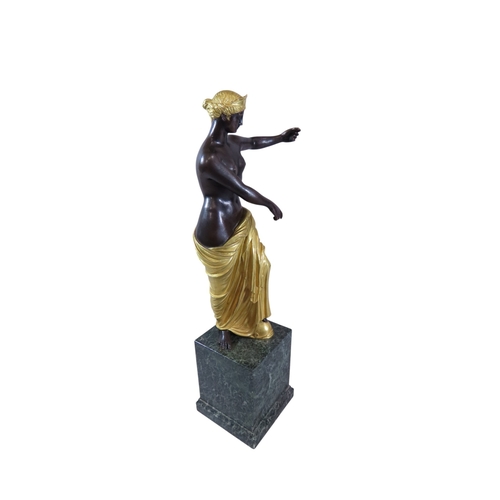 48 - A Late 18th / early 19th century continental patinated and gilt bronze figure of Venus, presented in... 