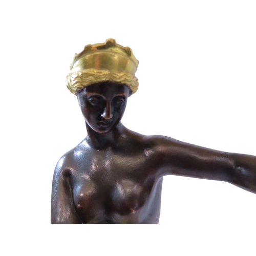 48 - A Late 18th / early 19th century continental patinated and gilt bronze figure of Venus, presented in... 