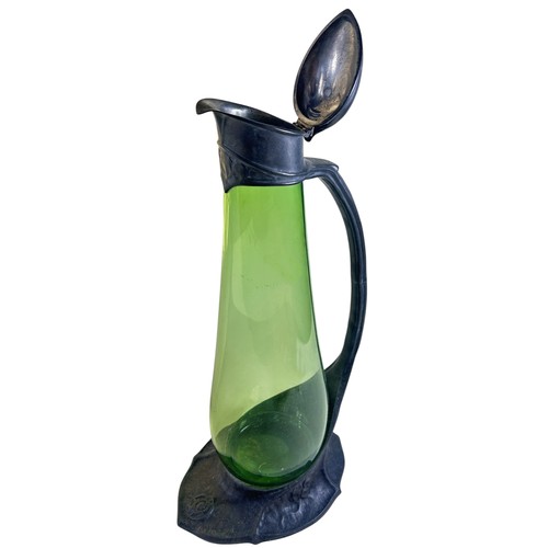 173 - Attributed to David Veasey (in the style of Archibald Knox) for Liberty & Co, a Tudric pewter and gr... 