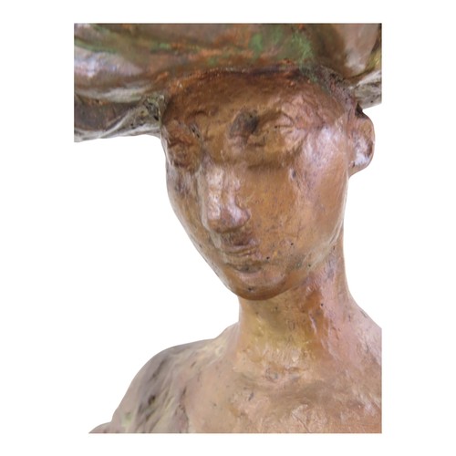 574 - A bronze statue by Tone Thiis Schjetne 1928-2015, female with turban hat, 42cm high