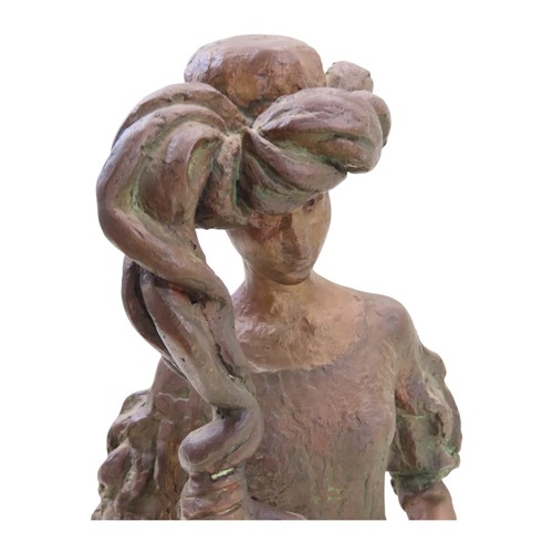574 - A bronze statue by Tone Thiis Schjetne 1928-2015, female with turban hat, 42cm high
