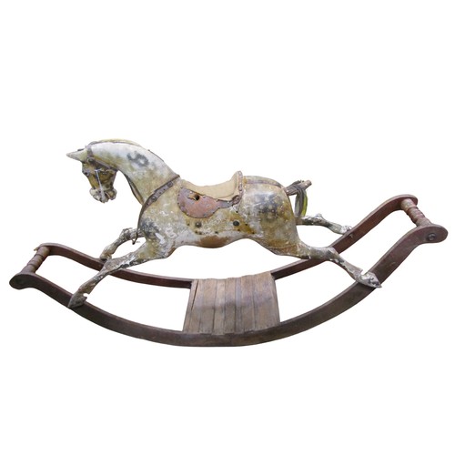 1406 - An Edwardian dapple grey rocking horse by G & J Lines, on a bow rockers, length 183cm, height to sad... 
