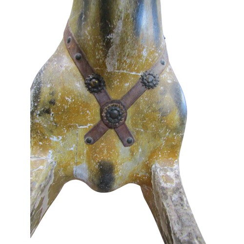 1406 - An Edwardian dapple grey rocking horse by G & J Lines, on a bow rockers, length 183cm, height to sad... 