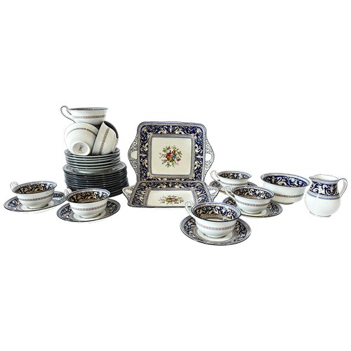 30 - Wedgwood Florentine pattern tea ware comprising: ten cups and saucers, twelve tea plates, two sandwi... 