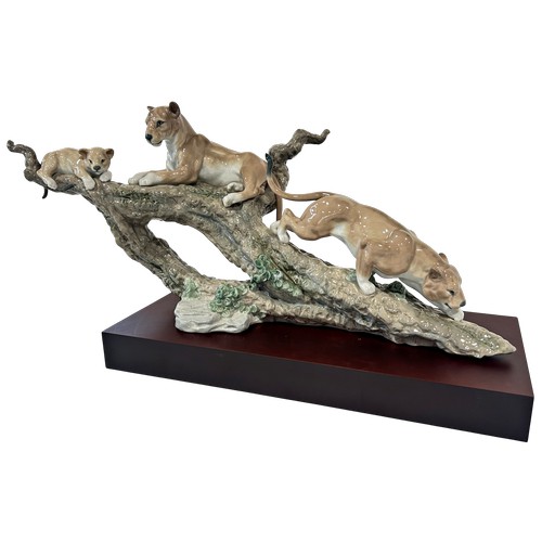 44 - A Lladro figure - three lions upon a tree stump, 'Spirit of Shambala' limited edition 227/1000 March... 
