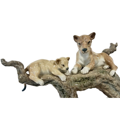 44 - A Lladro figure - three lions upon a tree stump, 'Spirit of Shambala' limited edition 227/1000 March... 