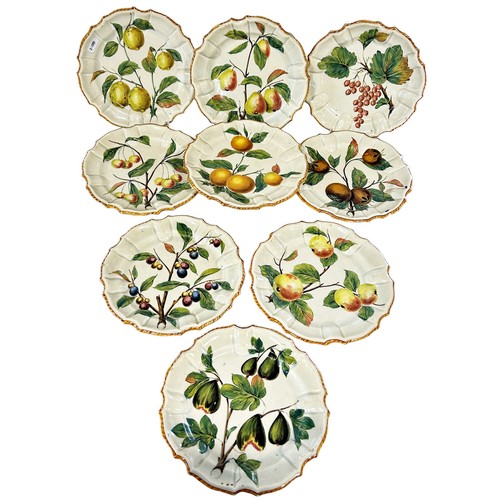 57 - Nine individual Italian majolica dishes depicting fruit within shaped borders