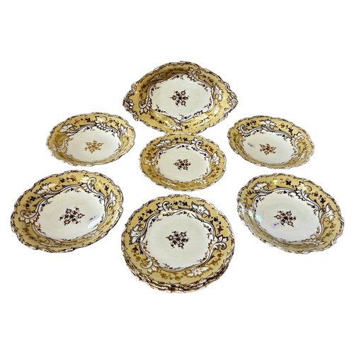 3 - A 19th century dessert service, with cream and gilt banded borders, eight plates and a shaped dish