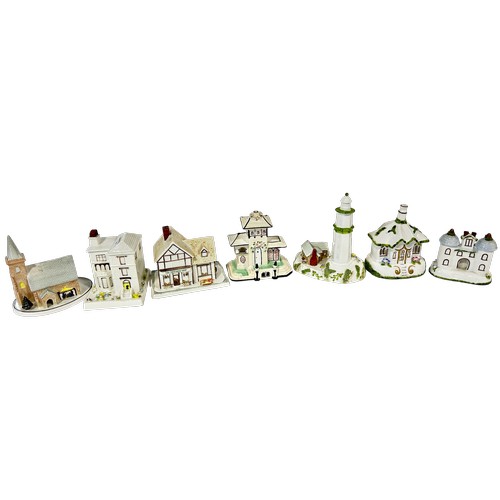 47 - A collection of 20 Coalport houses mainly of whimsical form, in the Victorian manner