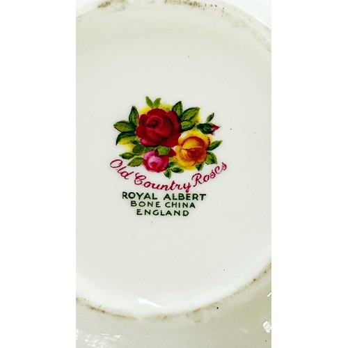 40 - A large quantity of Royal Albert Old Country Rose pattern table ware comprising 18 dinner plates, 25... 