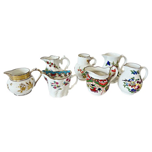 49 - A collection of 12 miniature Worcester jugs copying earlier styles, many with certificates (12)