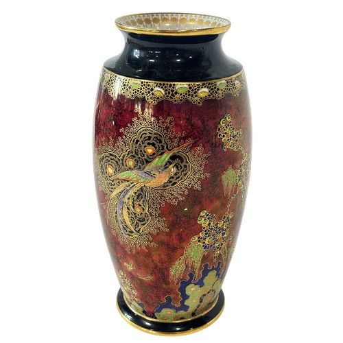 59 - A Carlton ware oviform vase with maroon ground and chinoiserie detail, 26cm high