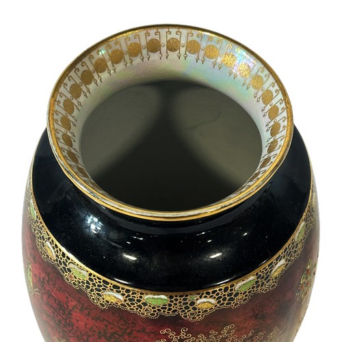 59 - A Carlton ware oviform vase with maroon ground and chinoiserie detail, 26cm high