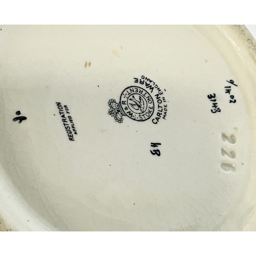59 - A Carlton ware oviform vase with maroon ground and chinoiserie detail, 26cm high