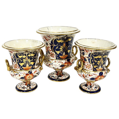 10 - Three 19th century Derby urn shaped vases, richly decorated with floral sprays in red, blue and gilt... 
