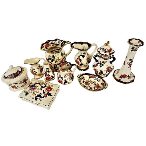 13 - A collection of Masons Mandalay ware comprising jugs, candlestick, lidded vase, painted box, etc (10... 