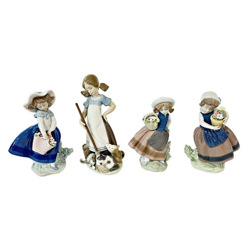 22 - Nine Lladro groups all children in various pursuits, together with a further figure of The Virgin Ma... 