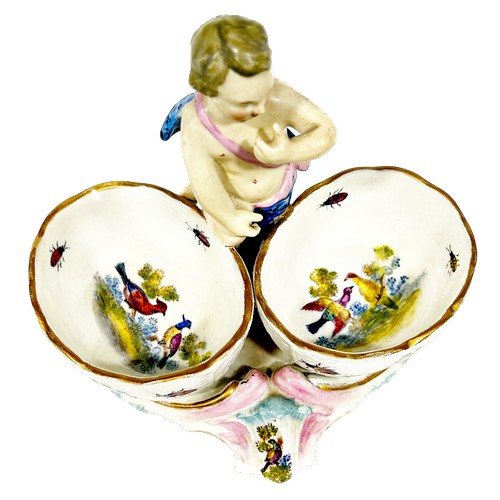 47 - A pair of 19th century Meissen double salts with cherub mounts and polychrome decoration of flowers ... 
