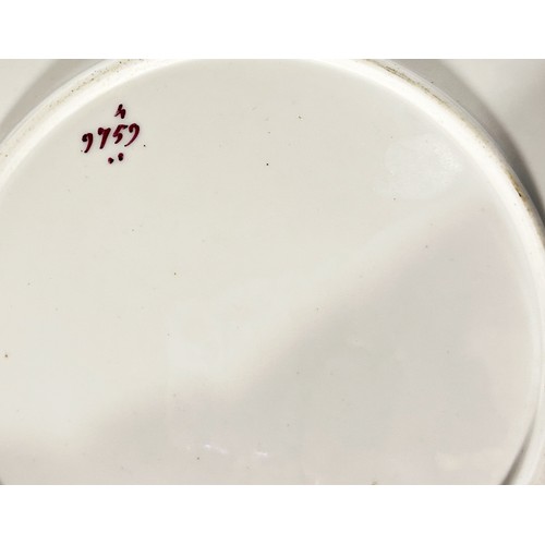 38 - A collection of 19th century porcelain ceramics comprising 13 plates, one high and two low comports,... 