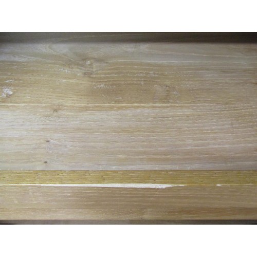 1523 - A fine quality Cotswold school fitted wardrobe in pale English walnut, the panelled frame enclosed b... 