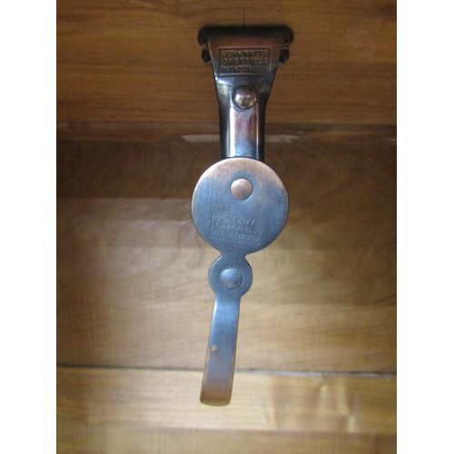 1523 - A fine quality Cotswold school fitted wardrobe in pale English walnut, the panelled frame enclosed b... 