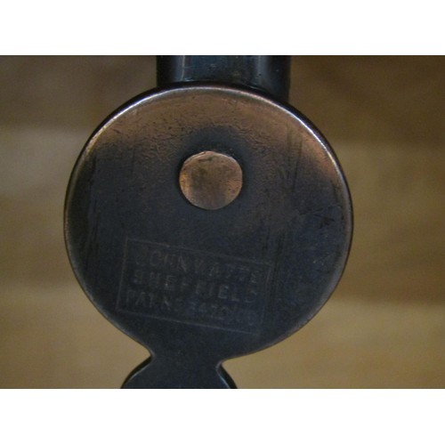 1523 - A fine quality Cotswold school fitted wardrobe in pale English walnut, the panelled frame enclosed b... 