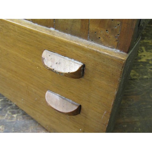 1523 - A fine quality Cotswold school fitted wardrobe in pale English walnut, the panelled frame enclosed b... 