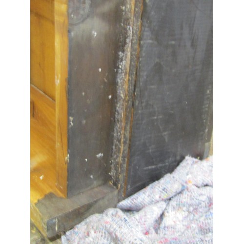 1523 - A fine quality Cotswold school fitted wardrobe in pale English walnut, the panelled frame enclosed b... 