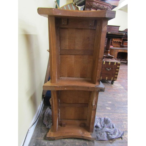 1523 - A fine quality Cotswold school fitted wardrobe in pale English walnut, the panelled frame enclosed b... 