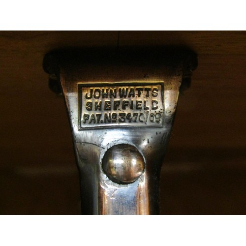 1523 - A fine quality Cotswold school fitted wardrobe in pale English walnut, the panelled frame enclosed b... 