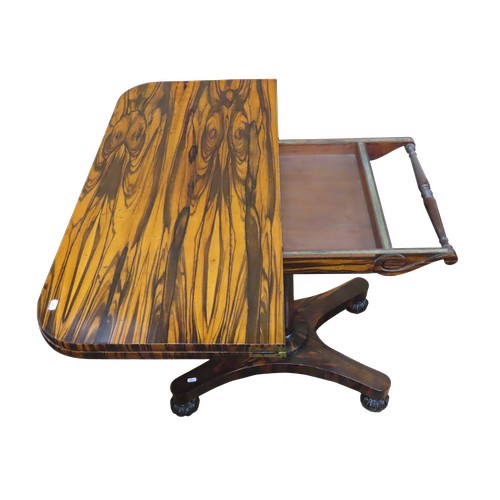 1524 - A 19th century fold over top card table, veneered in coromandel, raised on simple turned pillar with... 