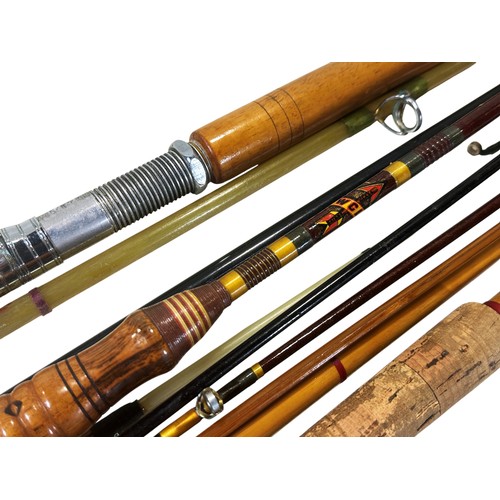 A group of vintage split cane and composite fishing rods