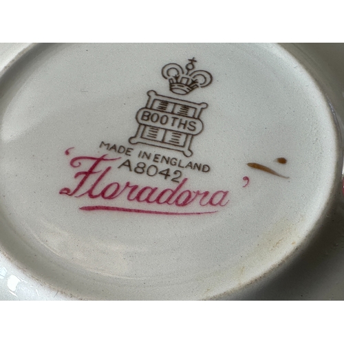 10 - A collection of Booths Flora Dora tea and coffee ware, with two pots, cups and saucers (two shapes)