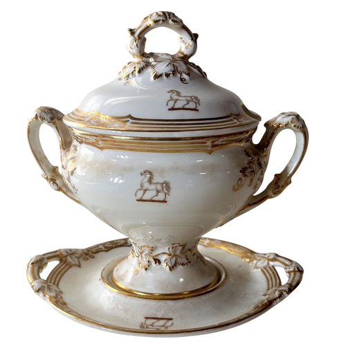 9 - A 19th century part dinner service, in white with gilded borders and armorial crest, comprising: gra... 