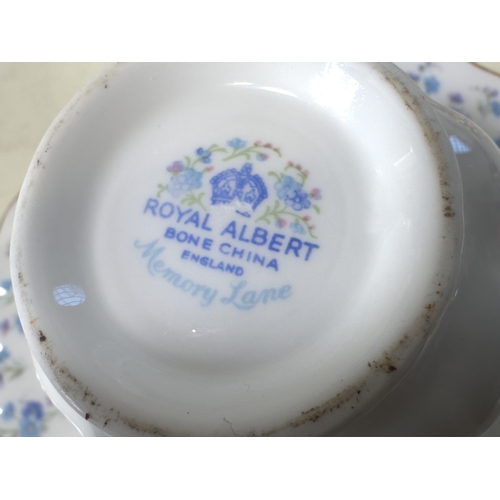 38 - A collection of Royal Albert Memory Lane dinner and tea ware, comprising: graduated plates, bowls, t... 