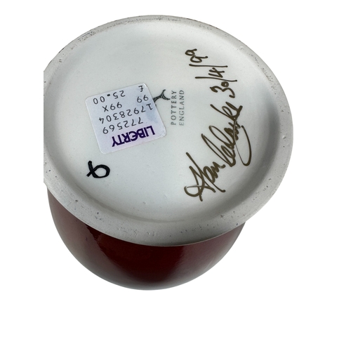 35 - Poole pottery ginger jar and cover, Volcano Peacock pattern, together with a matching oviform vase, ... 