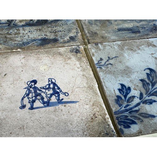 22 - A collection of nine 18th century Delft tiles, with character on landscape with floral detail, and t... 