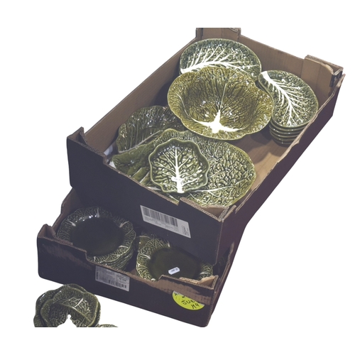 39 - A large collection of Secia of Portugal green leaf pattern tableware, comprising: graduated plates, ... 