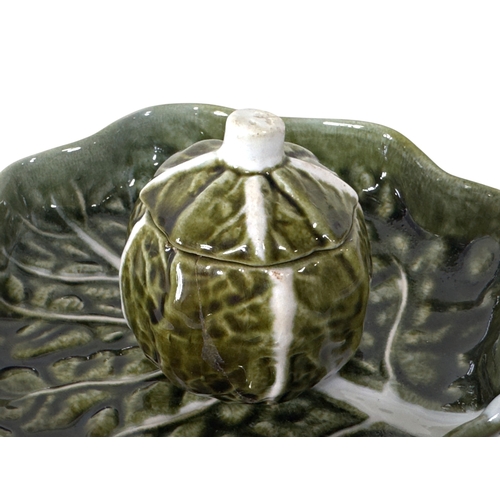 39 - A large collection of Secia of Portugal green leaf pattern tableware, comprising: graduated plates, ... 