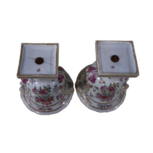 6 - A pair of French Samson of Paris armorial urns / vases, each campana shaped bowl on a pedestal foot ... 