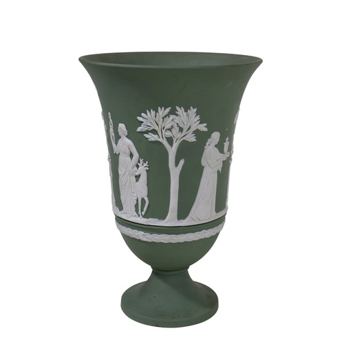 13 - A pair of blue Wedgwood Jasperware candlesticks, together with a campana shaped green Wedgwood vase,... 