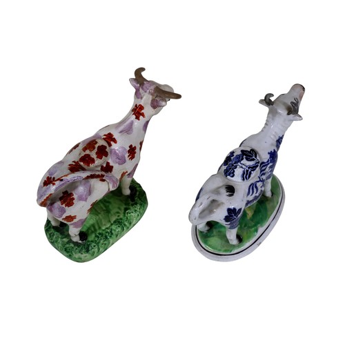 16 - Two 19th century Staffordshire cow creamers, one with Sunderland lustre detail, the other with Willo... 