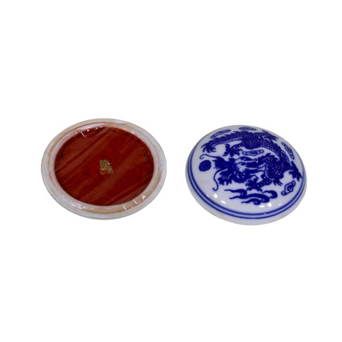 17 - A selection of mixed ceramics, including small Chinese boxes, two small blue and white platters, etc