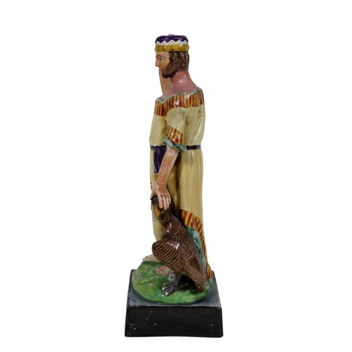 20 - A 19th century Staffordshire pearlware figure, modelled as Jupiter with crown, attendant eagle at hi... 