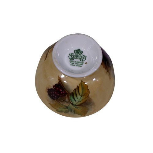 38 - A collection of Aynsley Orchard Gold tableware, comprising: six dinner plates, six side plates, six ... 